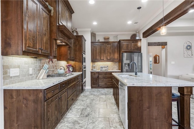 4004 Wild Creek Ct, College Station, TX 77845 - kitchen with stainless steel appliances, a breakfast bar, crown molding, tasteful backsplash, and dark brown cabinetry