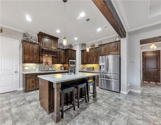 4004 Wild Creek Ct, College Station, TX 77845 - kitchen with appliances with stainless steel finishes, ornamental molding, light stone countertops, backsplash, and a center island with sink