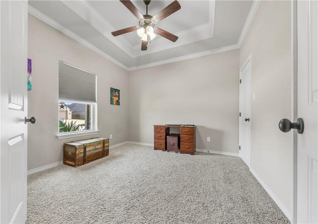 4004 Wild Creek Ct, College Station, TX 77845 - bedroom featuring a tray ceiling, carpet flooring, ornamental molding, and a ceiling fan