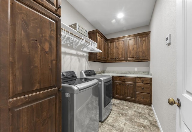 4004 Wild Creek Ct, College Station, TX 77845 - laundry room with washing machine and dryer and cabinet space