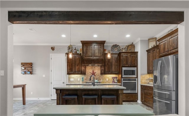 4004 Wild Creek Ct, College Station, TX 77845 - kitchen featuring appliances with stainless steel finishes, crown molding, dark brown cabinetry, tasteful backsplash, and pendant lighting