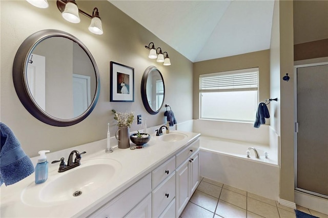 bathroom with tile patterned flooring, vanity, independent shower and bath, and vaulted ceiling