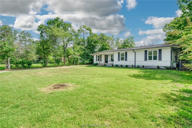 view of front of home with a front lawn