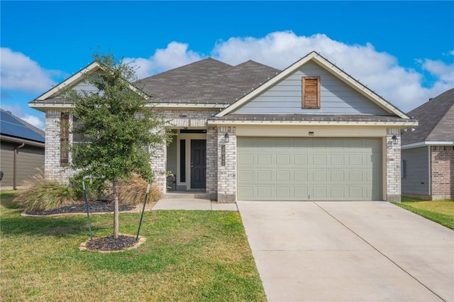 craftsman-style house featuring a front lawn and a garage