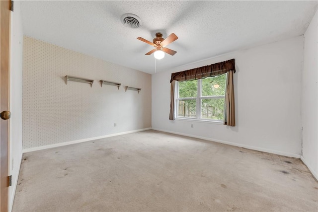 2100 Langford St, College Station, TX 77840 - carpeted spare room with ceiling fan and a textured ceiling