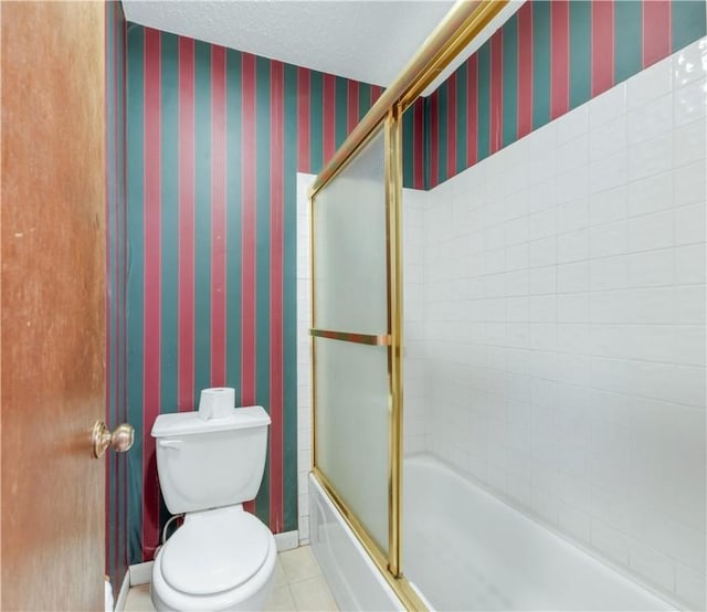 2100 Langford St, College Station, TX 77840 - full bath with bath / shower combo with glass door, wallpapered walls, and tile patterned floors