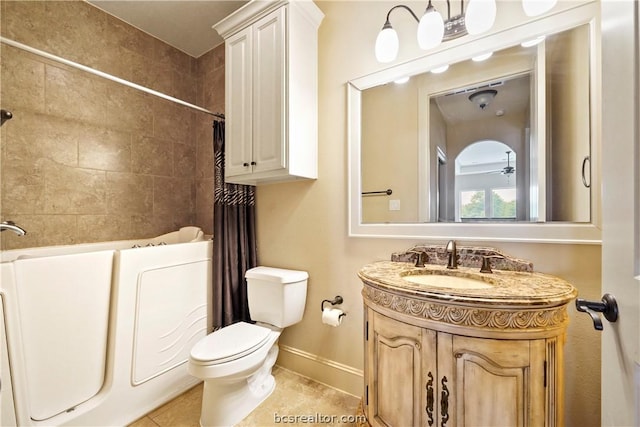 full bathroom featuring tile patterned flooring, vanity, toilet, and shower / bathtub combination with curtain