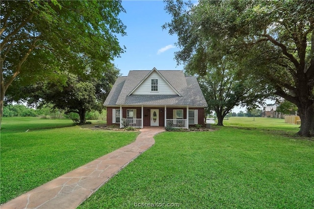 view of front facade featuring a porch and a front yard