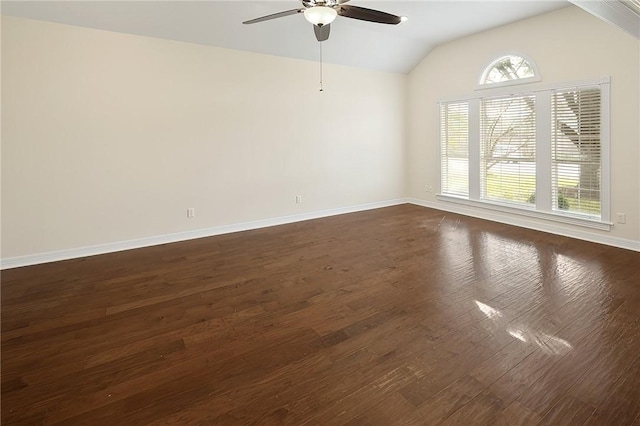 unfurnished room with ceiling fan, vaulted ceiling, and dark wood-type flooring