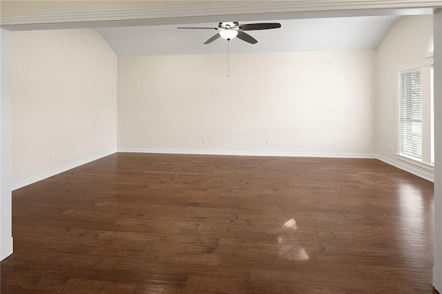 spare room featuring lofted ceiling, ceiling fan, and dark hardwood / wood-style floors