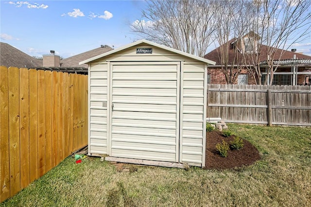 view of outbuilding featuring a lawn