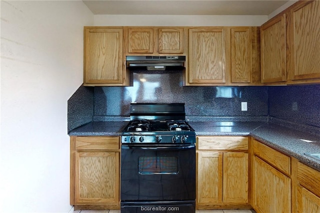 kitchen with backsplash and black range with gas stovetop