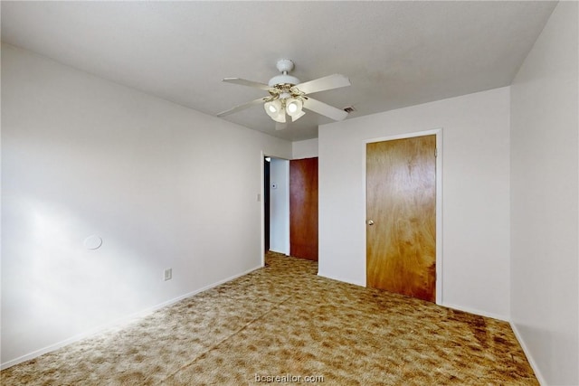 unfurnished bedroom featuring carpet flooring, ceiling fan, and a closet