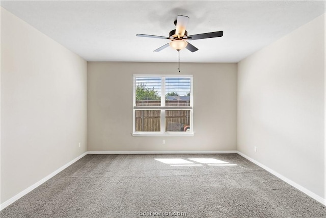 carpeted empty room with ceiling fan