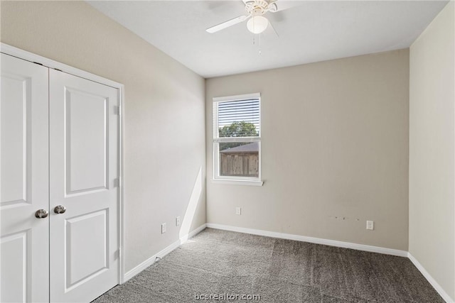 interior space with ceiling fan, a closet, and carpet