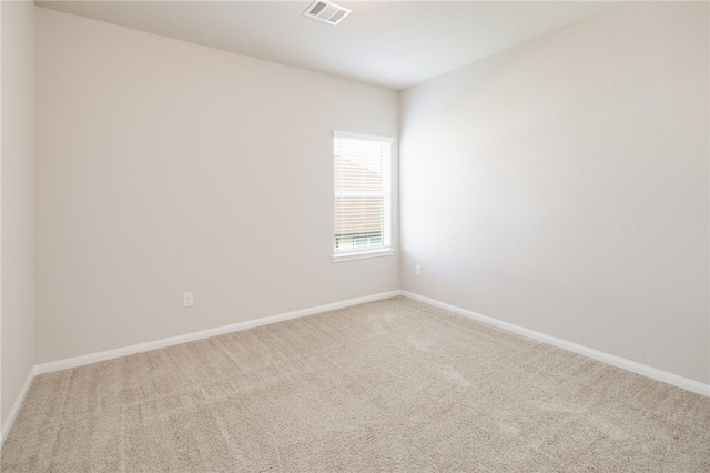 996 Marquis Dr, Bryan, TX 77803 - carpeted spare room featuring baseboards