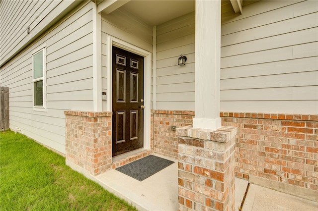 996 Marquis Dr, Bryan, TX 77803 - view of exterior entry with a porch
