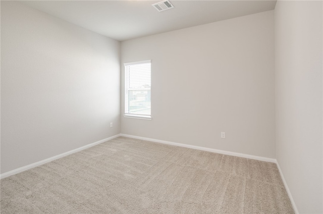 996 Marquis Dr, Bryan, TX 77803 - carpeted spare room with baseboards