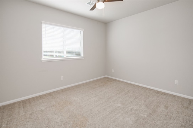 996 Marquis Dr, Bryan, TX 77803 - empty room with carpet floors, a ceiling fan, and baseboards