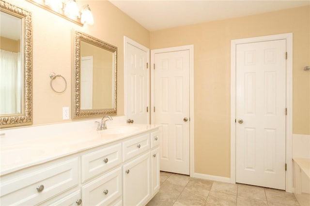 bathroom featuring vanity and tile patterned floors