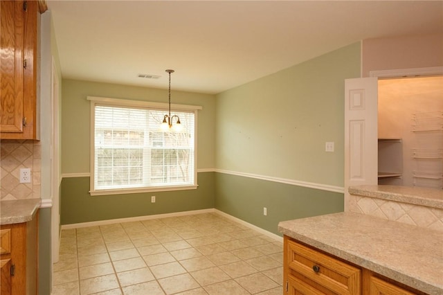 dining room with light tile patterned flooring