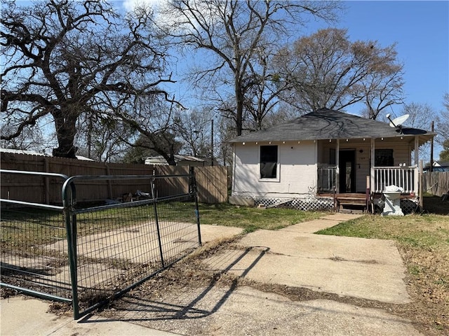 view of property exterior with covered porch