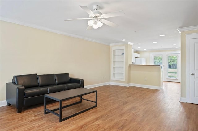 1725 Harvey Mitchell Pkwy, College Station, TX 77840 - living room with ornamental molding, baseboards, a ceiling fan, light wood-type flooring, and recessed lighting