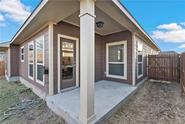 entrance to property featuring a patio