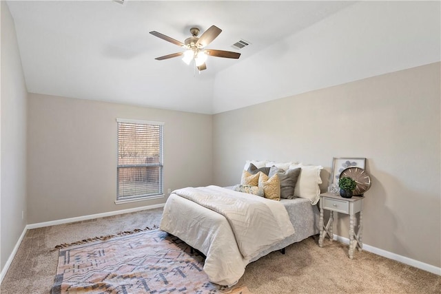 bedroom featuring ceiling fan, carpet flooring, and lofted ceiling