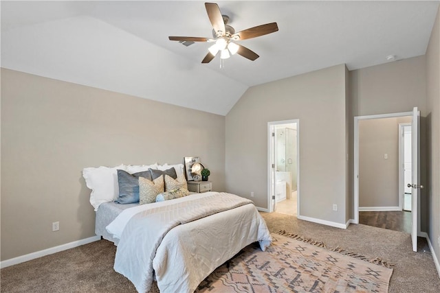 carpeted bedroom with ceiling fan, vaulted ceiling, and connected bathroom