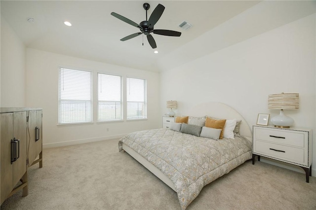 bedroom featuring light colored carpet, visible vents, baseboards, recessed lighting, and a ceiling fan