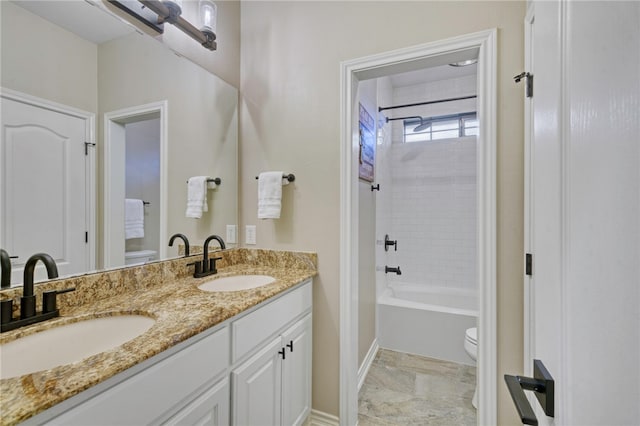 full bathroom with vanity, shower / bathing tub combination, and toilet