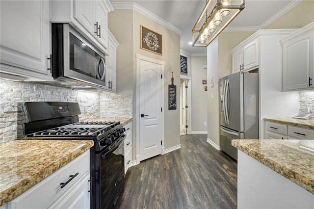 kitchen featuring crown molding, stainless steel appliances, tasteful backsplash, light stone countertops, and white cabinets