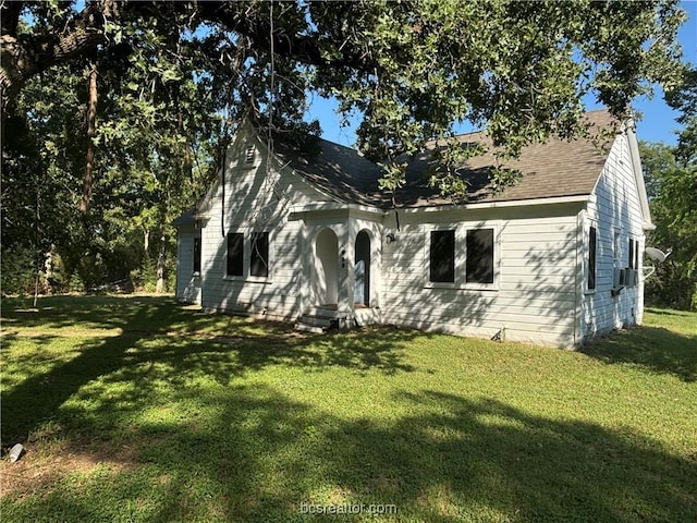 exterior space with a front yard