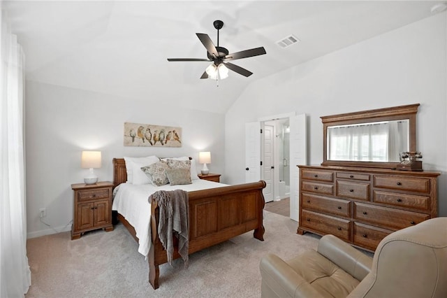 bedroom with light colored carpet, ceiling fan, and lofted ceiling