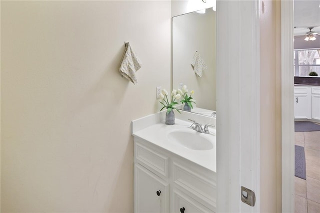 bathroom with a ceiling fan and vanity