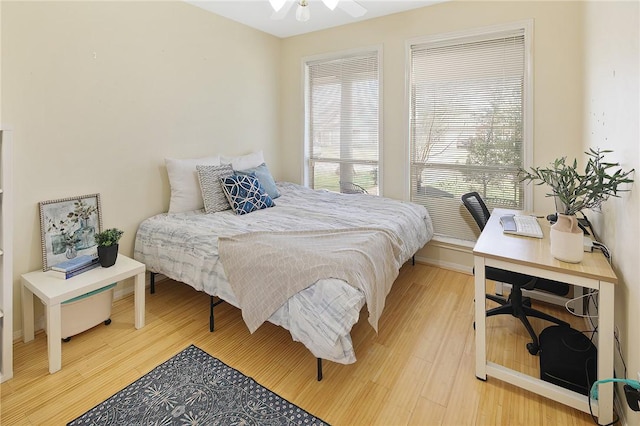 bedroom featuring light wood-style flooring