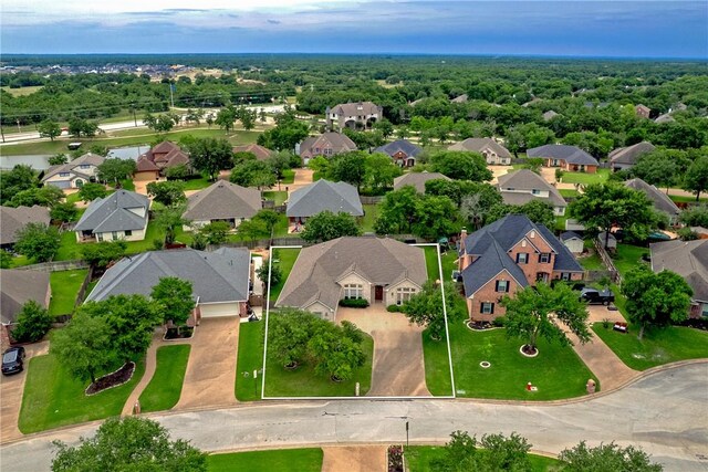 aerial perspective of suburban area with property boundaries highlighted