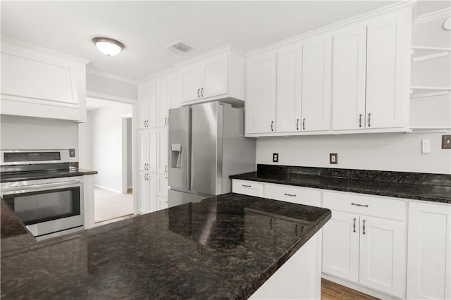 3614 Oak Ridge Dr, Bryan, TX 77802 - kitchen featuring stainless steel appliances, open shelves, white cabinetry, crown molding, and dark stone counters