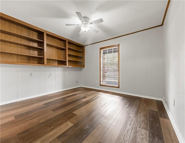 3614 Oak Ridge Dr, Bryan, TX 77802 - empty room featuring a ceiling fan, dark wood finished floors, and crown molding