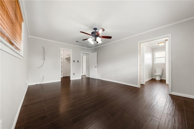 3614 Oak Ridge Dr, Bryan, TX 77802 - unfurnished living room featuring ceiling fan, dark wood-style floors, and ornamental molding