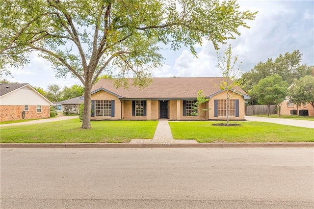 3614 Oak Ridge Dr, Bryan, TX 77802 - ranch-style house featuring driveway