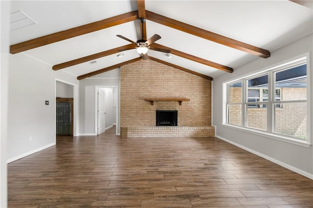 3614 Oak Ridge Dr, Bryan, TX 77802 - unfurnished living room featuring dark wood finished floors, ceiling fan, and a brick fireplace
