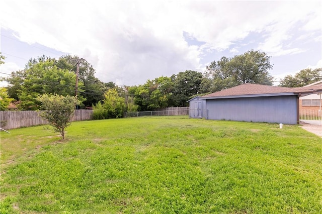 3614 Oak Ridge Dr, Bryan, TX 77802 - view of yard featuring a storage unit