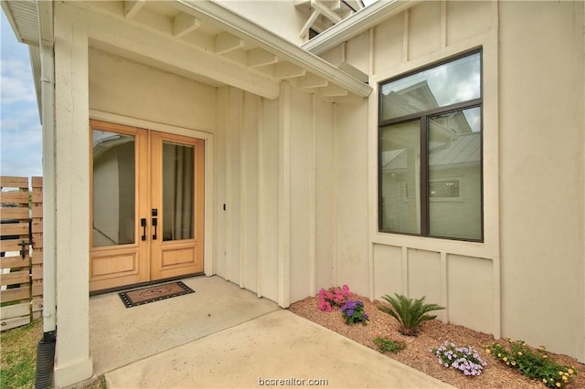 doorway to property with french doors