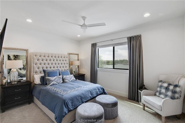 carpeted bedroom featuring ceiling fan