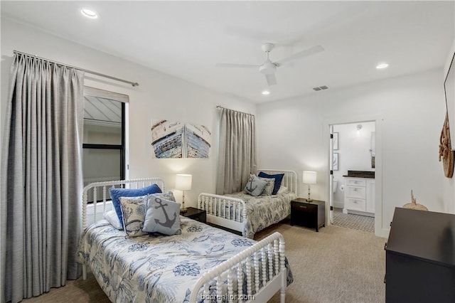 carpeted bedroom featuring ceiling fan