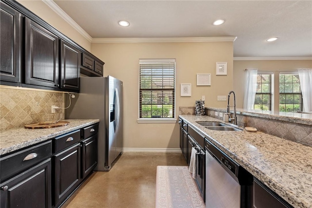 3015 Towers Pkwy, College Station, TX 77845 - kitchen featuring appliances with stainless steel finishes, concrete flooring, decorative backsplash, healthy amount of natural light, and recessed lighting