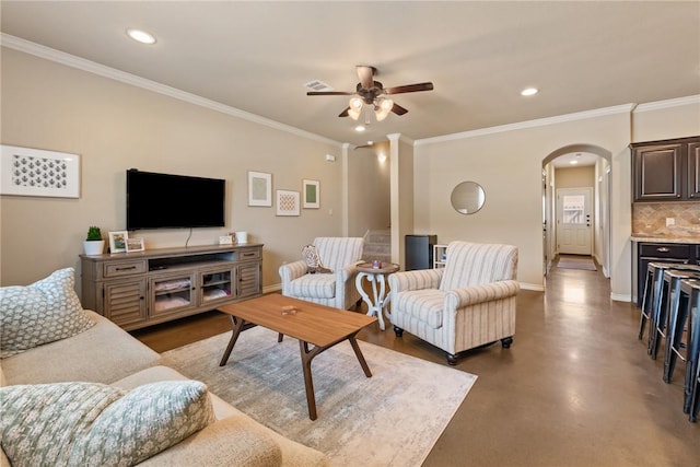 3015 Towers Pkwy, College Station, TX 77845 - living room with arched walkways, a ceiling fan, recessed lighting, ornamental molding, and concrete floors