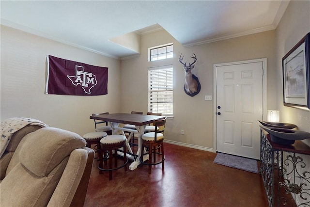 dining area featuring ornamental molding